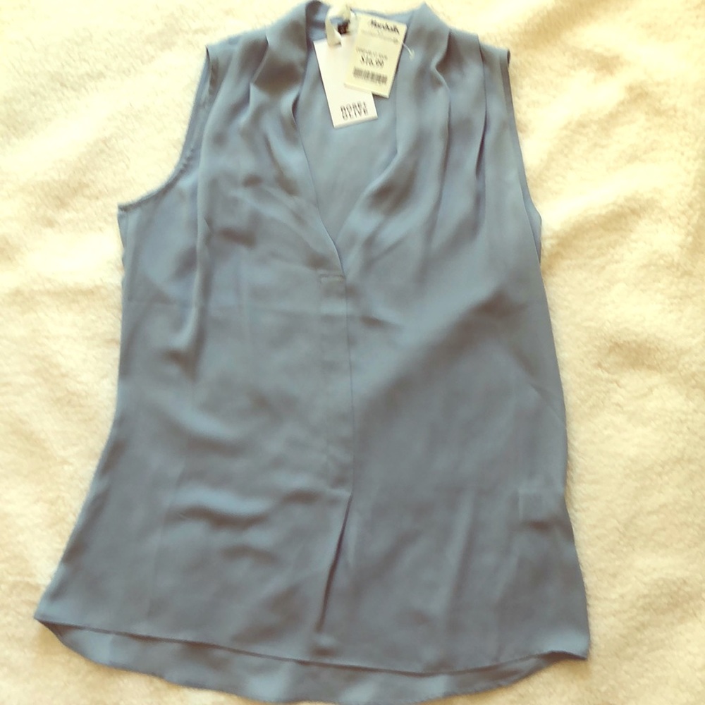 Light blue sleeveless blouse